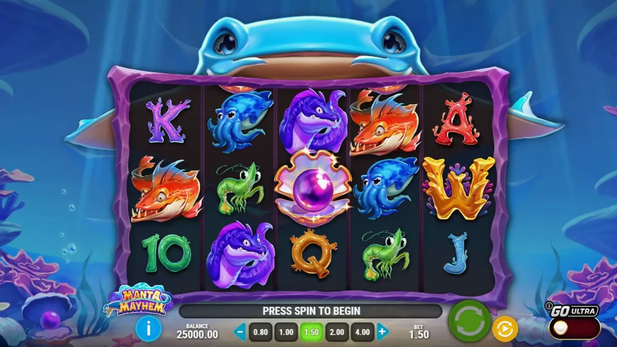 Tampilan visual slot Manta Mayhem dengan latar belakang terumbu karang dan ikan pari biru.